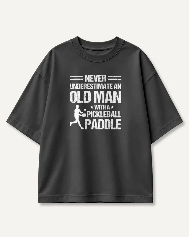 Never Underestimate an Old Man with a Pickleball Paddle Oversized T-Shirt in Black — front