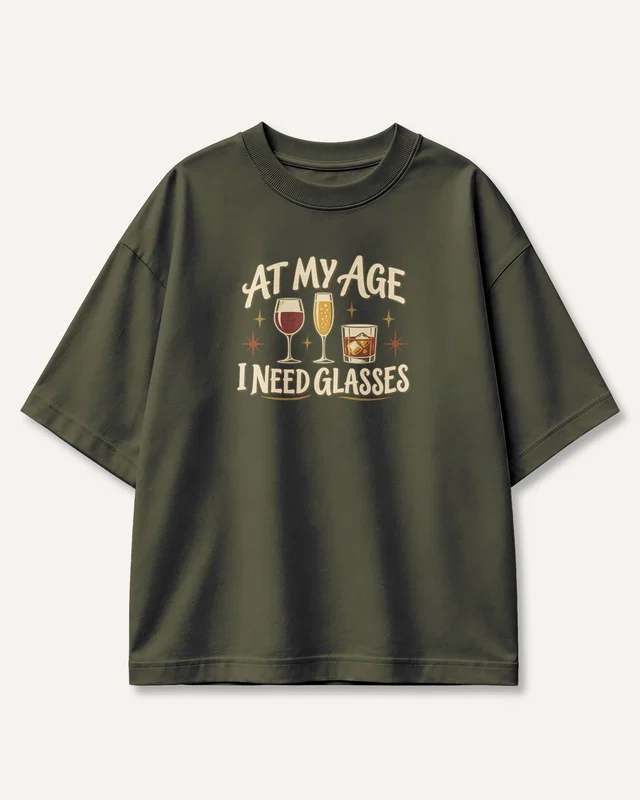 At My Age I Need Glasses Oversized T-Shirt in Olive Green — front