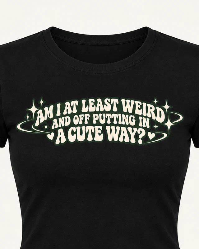 Weird in a Cute Way Graphic Crop Top in Black — cropped design detail
