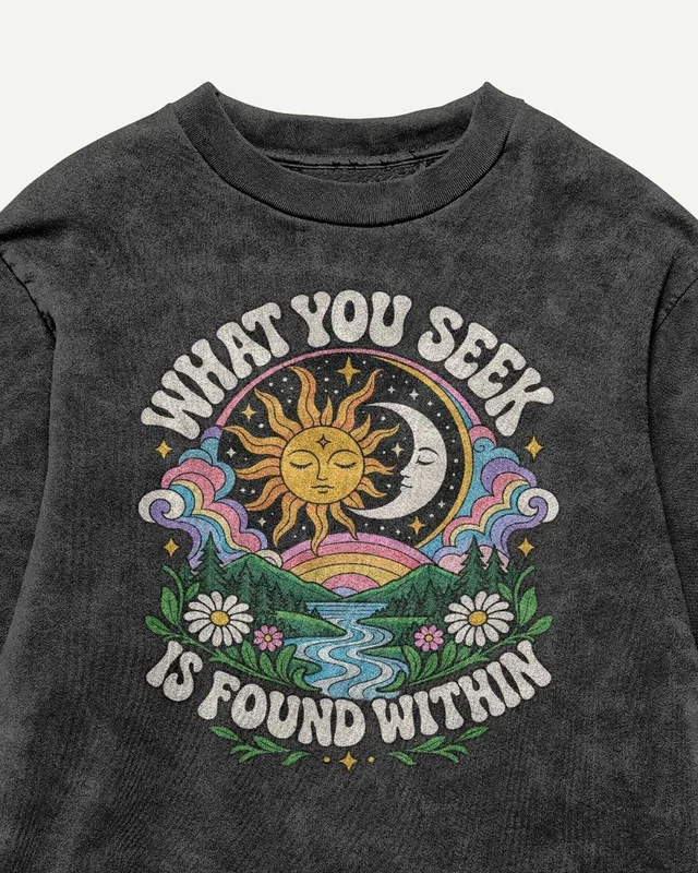 What You Seek Is Found Within Acid-Wash Oversized T-Shirt in Black — design detail